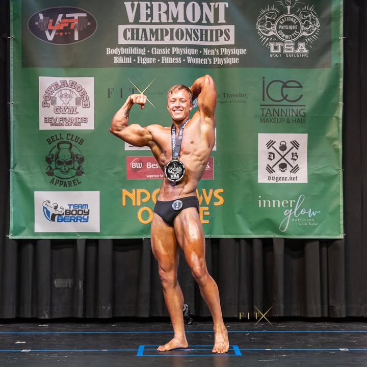 Titans Gym co-owner Elijah Milligan competing at the Vermont Championships